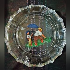 Large glass ashtray with cute golfing motif
